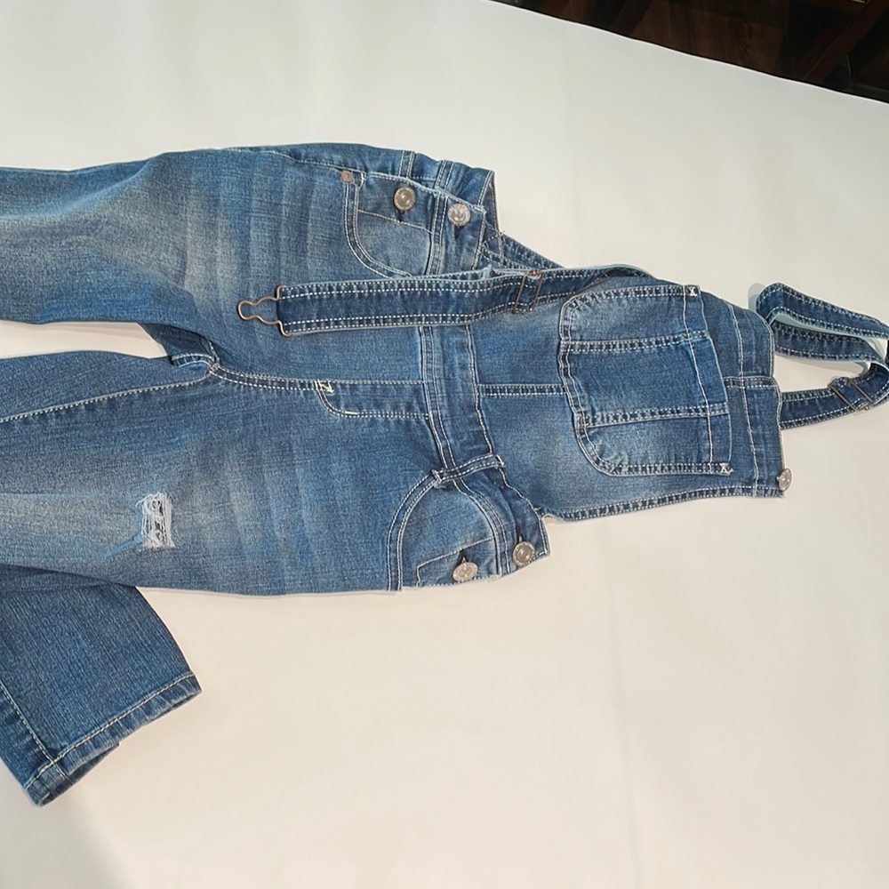 Fitted overalls size XS with rips